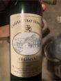 chateau vray houchat fronsac  on black wooden table